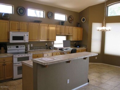 Open Kitchen with Tiled Countertops
