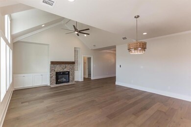 fireplace in living room with built-ins