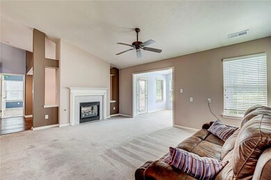 Great room with view of the double sided fireplace.