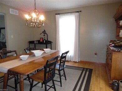 Newer hardwood flooring in formal separate dining 