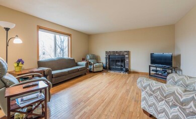 Main floor family room with gas fire place and hug