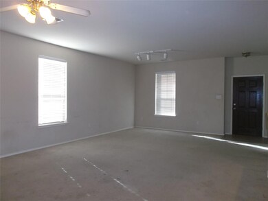 Unfurnished room with ceiling fan