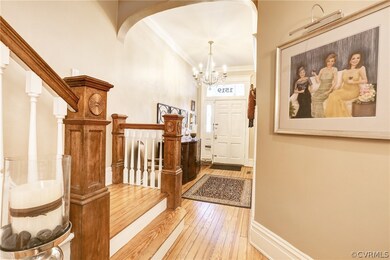 Beautiful turned staircase. Note the etched house