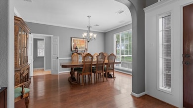 The photo showcases a spacious dining room featuri