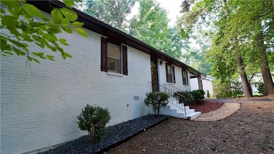 View of side of property with brick siding