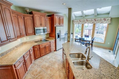 Spacious 22x13 custom kitchen with tile flooring, 