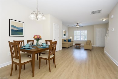 Open floor plan on the main, staged.