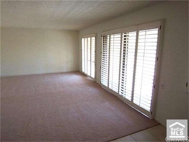 LARGE LR WITH PLANTATION SHUTTERS & NEW CARPET