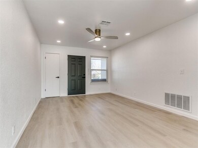 Unfurnished room with light wood-type flooring and