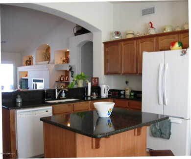 Kitchen with Island and Maple Cabinets