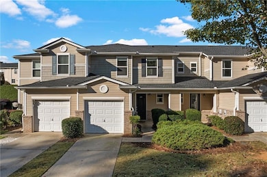 View of front facade featuring covered porch, driveway, brand new roof with shingles, and vinyl siding