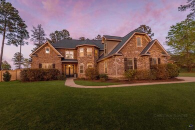 Beautifully landscaped front yard adds to the home