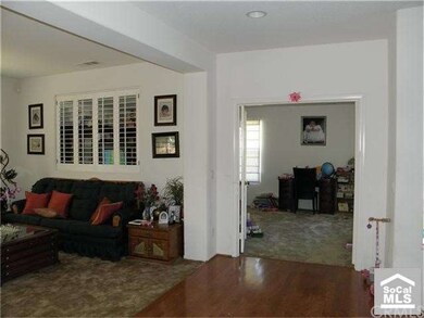 Living Room with Bonus room Behind it