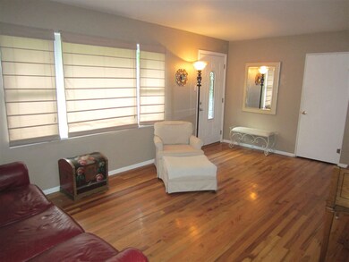 The spacious Living Room had an entry closet and h
