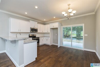 Sliding Doors with private wooded views.