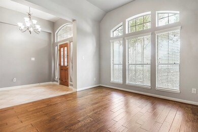 Large wood plank floors in the study.  Natural light floods through as you work from home!