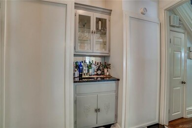The Butler's Pantry features a wet bar & glass fro