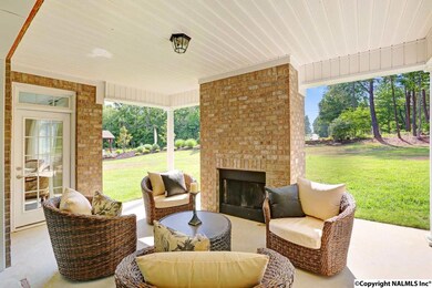 ENJOY YOUR OUTDOOR FIREPLACE AND COVERED VERANDA