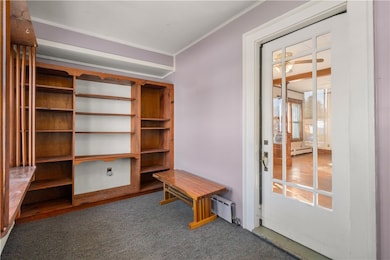 Heated entry with built-in bookcase
