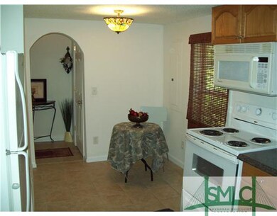Kitchen. Breakfast Area showing door to laundry ro