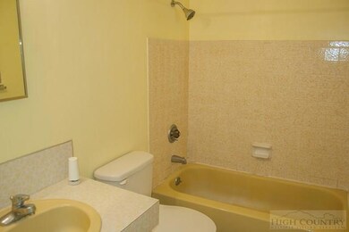Shared full bath on the upper level.