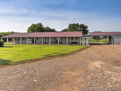 The circle driveway offers plenty of parking for a