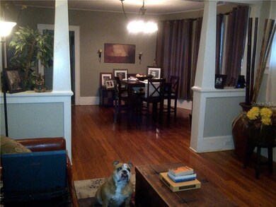 View of original heart of pine floors in formal di