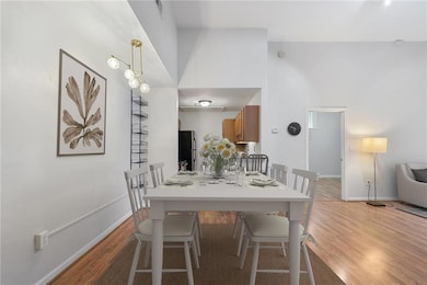 Open Concept Kitchen/Dining/Living (Virtually Staged)