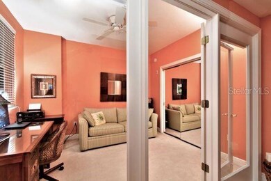Guest bedroom located just off the foyer with large closet and window plus pull down blinds on the glass doors for privacy.
