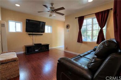 Living Room - Upgraded laminate hard wood flooring