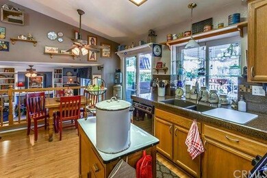 Kitchen opens into family room and out onto custom