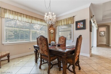 Formal Dining Area Overlooking the Pool Lanai