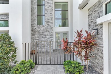 Gated front courtyard entry