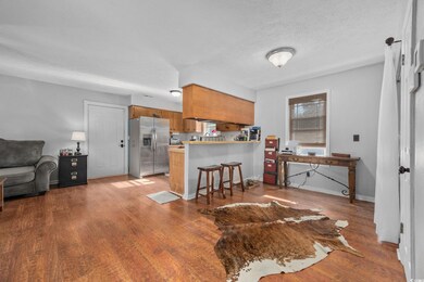 Kitchen featuring stainless steel fridge with ice 