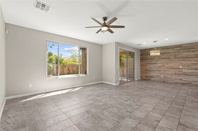 Tiled empty room with plenty of natural light, cei