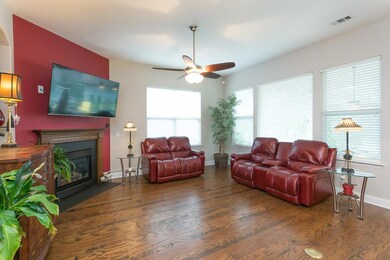 The Windows Allow Glorious Natural Light To Flood This Great Room!
