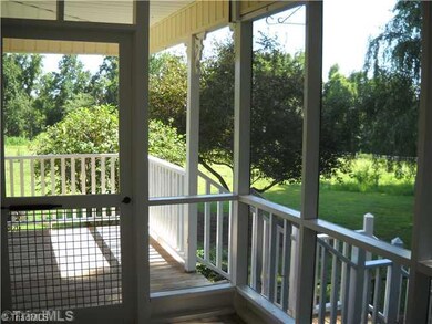 Enclosed Porch. PRIVATE SCREENED PORCH OFF MASTER BEDROOM