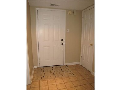 Be greeted by a tiled entry with large closet.