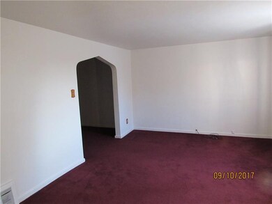 Large Living Room!  Hardwood Floors are under carp