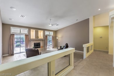 Large Sunken Living room open to the Kitchen