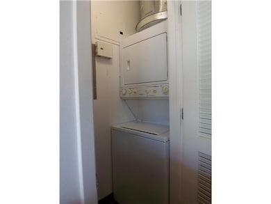 Laundry area with stacked washer / drying machine