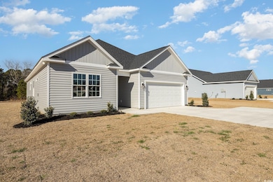 View of front facade featuring a front lawn and a 