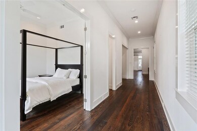 SIDE HALL. WOOD FLOORS THROUGHOUT