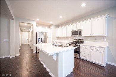 Modern stainless steel appliances complete the sle