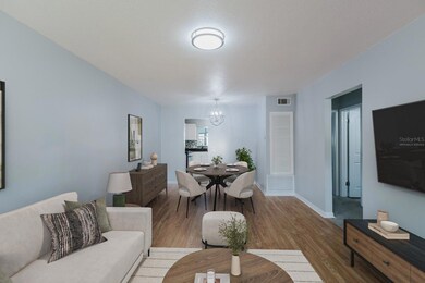 Living/dining, virtually staged.