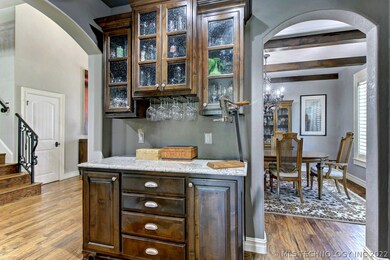Rich cabinets in the Butler and Bar are finished w