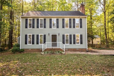 Gorgeous front yard of 13609 Fox Chase Terrace!
