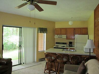 Kitchen. Appliances are included along with a stac