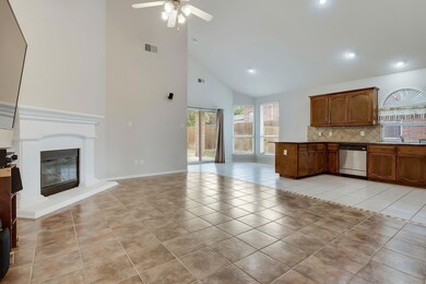 A Soaring Ceiling Creates Spaciousness In This Ope