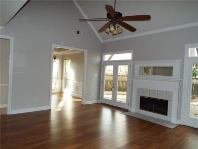 Great room with vaulted ceiling, NEW wood flooring